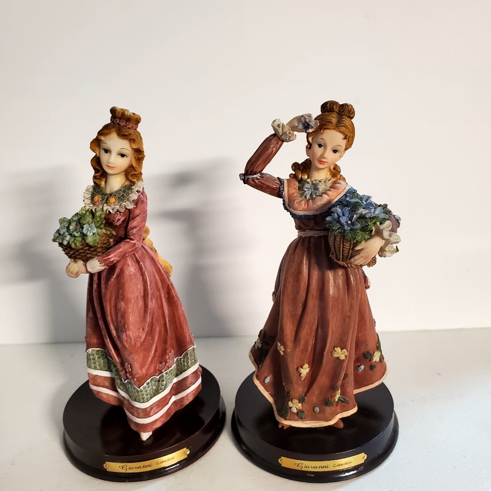 2 Giovanni Collection Lady Figurerines  9in tall holding flowers.